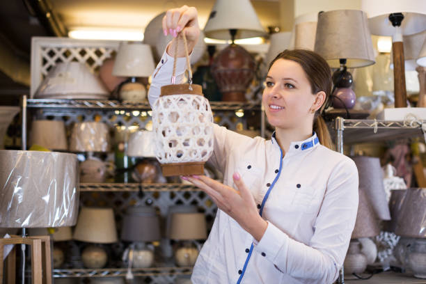 istock woman is buying lamp 913339696