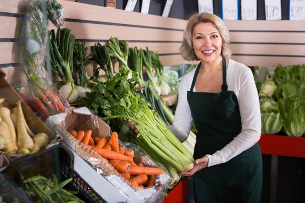 istock Mature woman selling vegetables 913339794