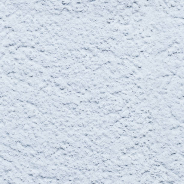 istock Seamless texture of a white stone wall. 913343952