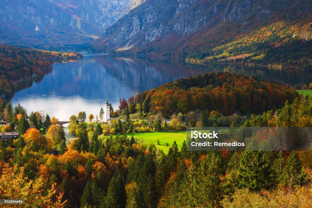 Aerial view of Bohinj lake in Julian Alps, Slovenia Aerial view of Bohinj lake in Julian Alps.  Popular touristic destination in Slovenia. Bohinj Stock Photo