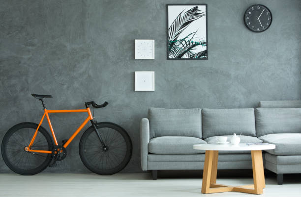 istock Orange bicycle in apartment interior 913359868