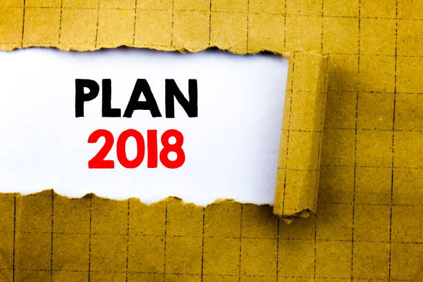 istock Word, writing Plan 2018. Business concept for Planning Strategy Action Plan written on white paper on the yellow folded paper. 913367272