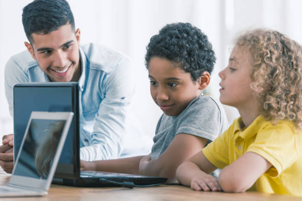 istock Afro-american boy playing video games 913370236