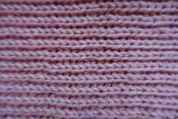 istock Simple pink rib knitted fabric from above 913378924