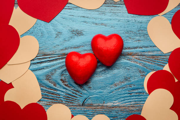 istock Valentines day background decorated with red hearts/copy space 913383962