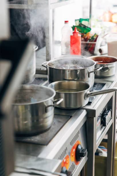 istock various dishes cooking in sauce pans at restaurant kitchen 913394870