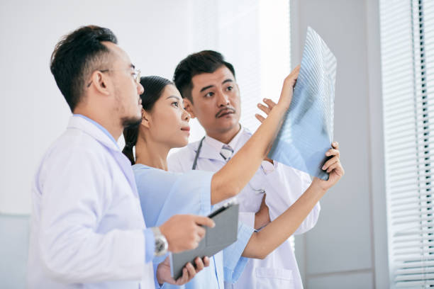 istock Doctor discussing x-ray 913395560