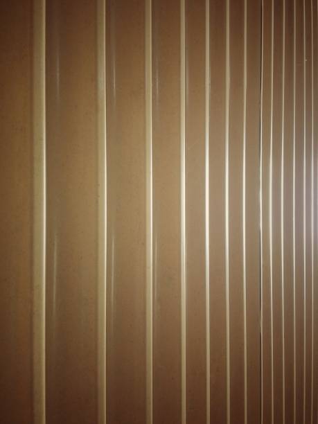 istock Abstract pattern background of the yellow corrugated metal 913395862
