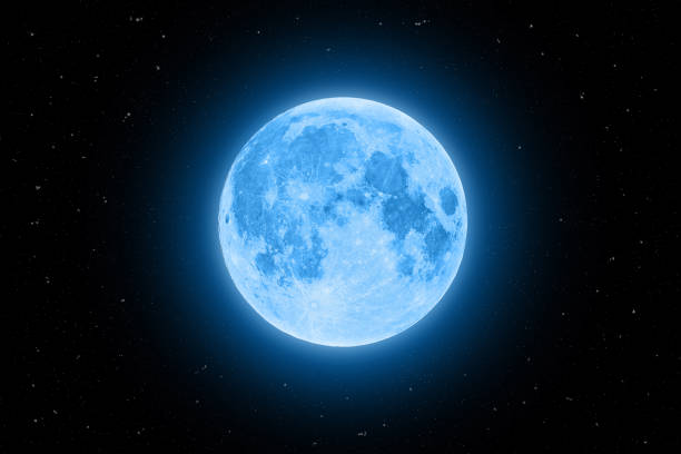 istock Blue super moon glowing with blue halo isolated on black background 913399840