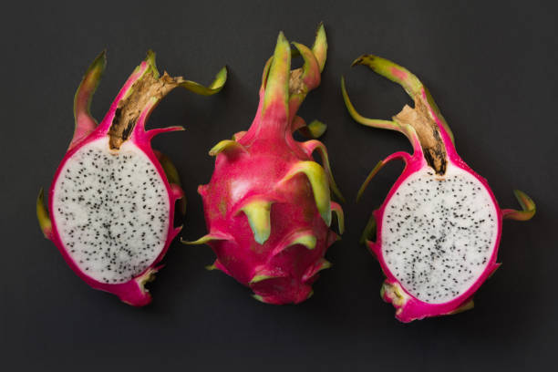 istock Isolated tropical pitaya, dragon fruit on black. Close up. top view. 913407254