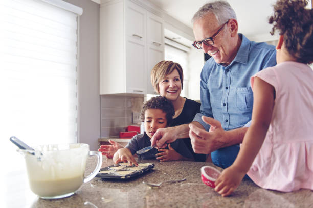 istock Grandparents cooking with kids 913410780