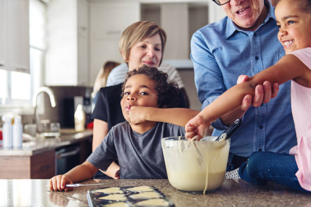 istock Grandparents cooking with kids 913410796