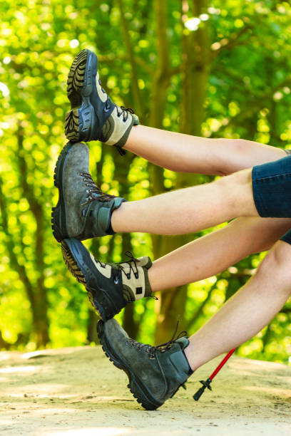 istock Couple having fun waving legs. 913414570