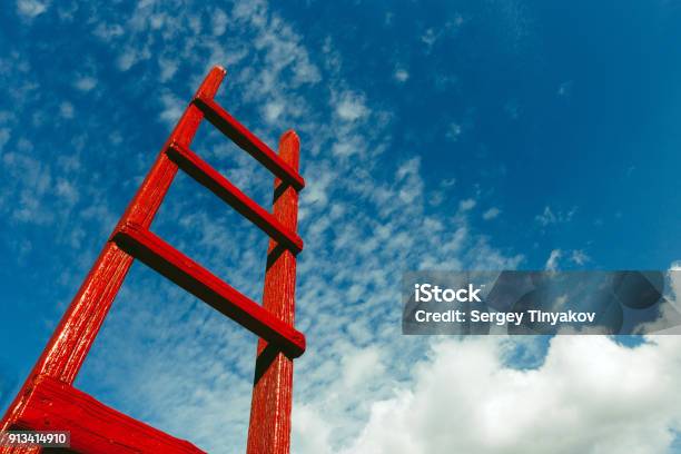 Red Wooden Staircase Against The Blue Sky Development Motivation Busines Career Heaven Growth Concept Stock Photo - Download Image Now
