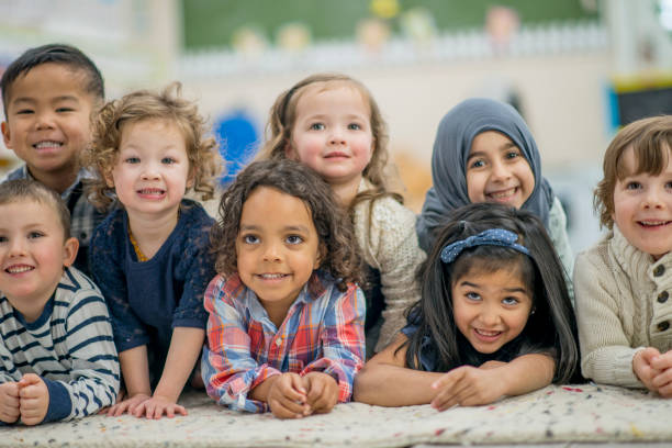 istock Kids Laying Together 913415824