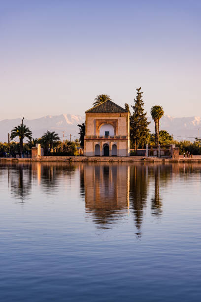 istock Menara Gardens Pavilion reflect in water at sunset,Morocco 913426070