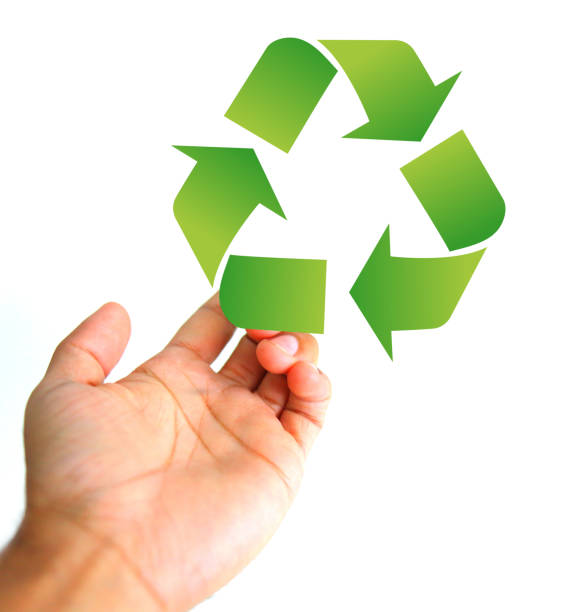 istock Help concept. Hand holding a recycle sign 913426416