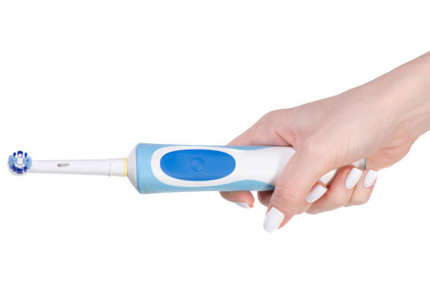 istock Electric toothbrush in hand 913426602