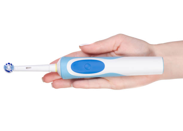 istock Electric toothbrush in hand 913426618