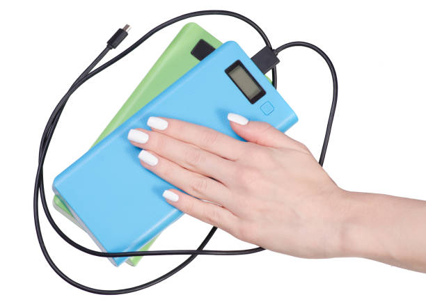 istock Power bank in female hands 913426830