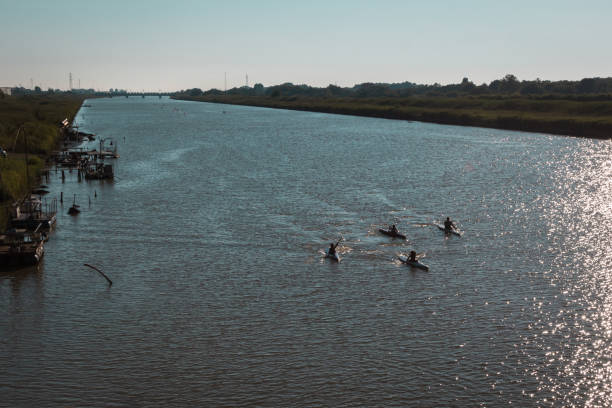 istock Silhouette of Canoes Competition on the River 913430320