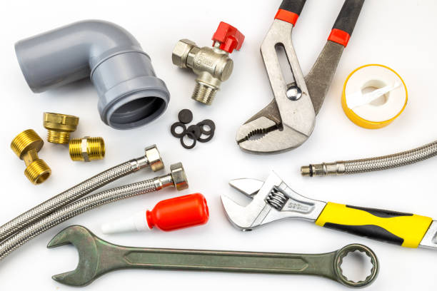 istock plumbing tools and equipment on white. top view 913431550