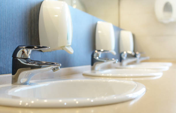 Silver faucet and white sink