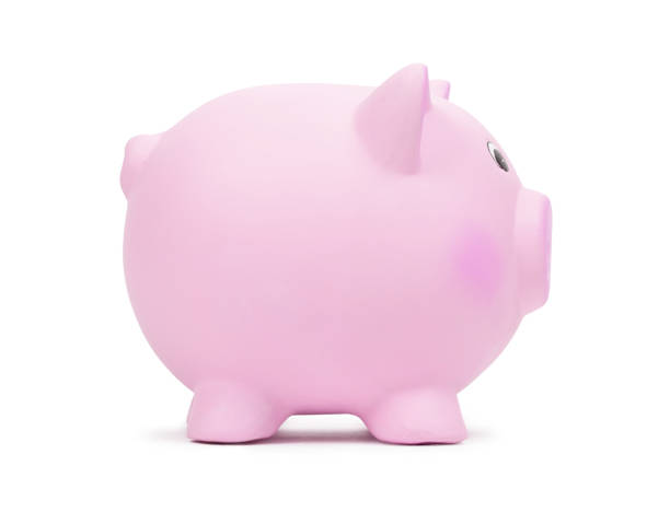 istock Pink ceramic piggy bank, isolated on white background 913435876
