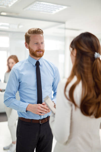 istock Young business people discussing new business projects and ideas 913441976