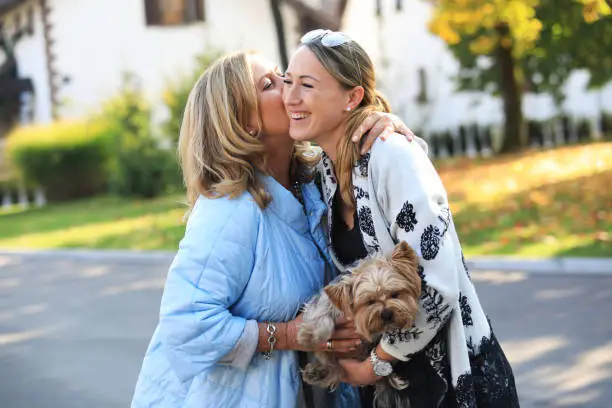 Real mother , daughter and their yorkie. Hygge happy life