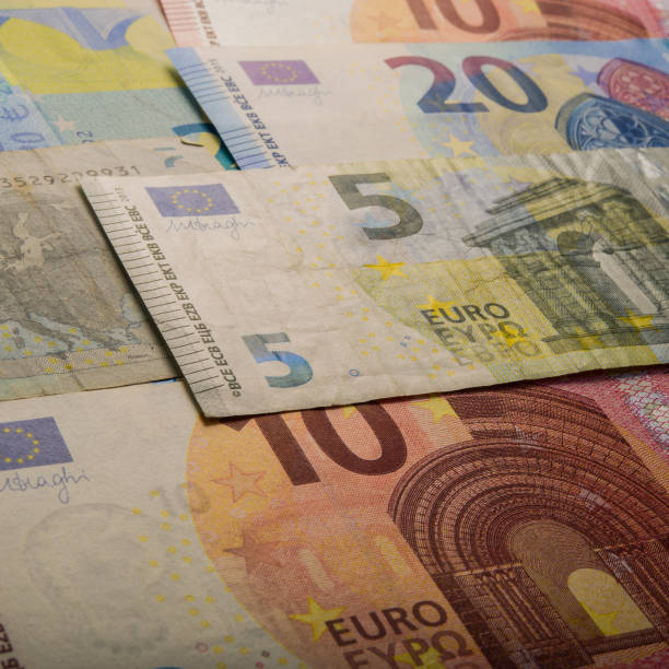 istock paper euro notes. Five, twenty and ten euros. 913452422