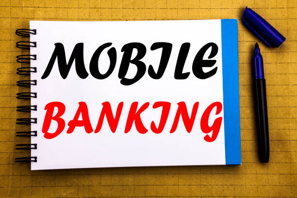 istock Mobile Banking. Business concept for Internet Banking e-bank Written on notepad note paper background with space office view with pencil marker 913452458