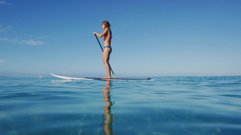 Woman Stand Up Paddle Boarding