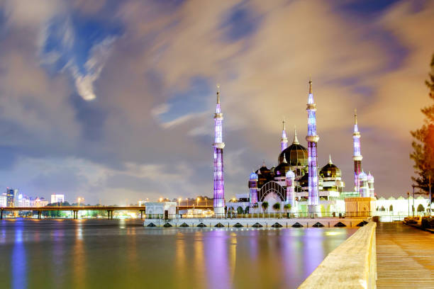 istock Moving clouds over Crystal Mosque, Malaysia. 913466178