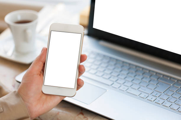 istock Working on laptop and mobile phone 913470238