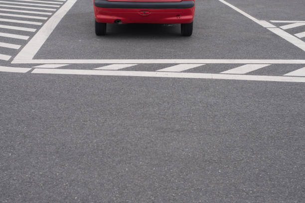 istock close up on red car in the parking 913471040