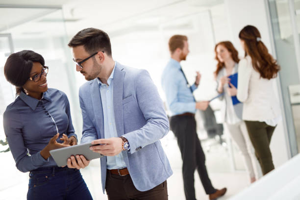 istock Teamwork and technology - Invaluable to modern business 913475632