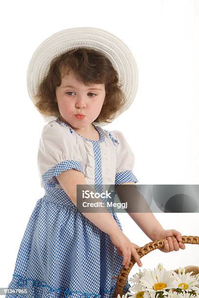 Little Beautiful Girl With Bonnet Stock Photo - Download Image Now - Affectionate, Basket, Bonnet - Hat