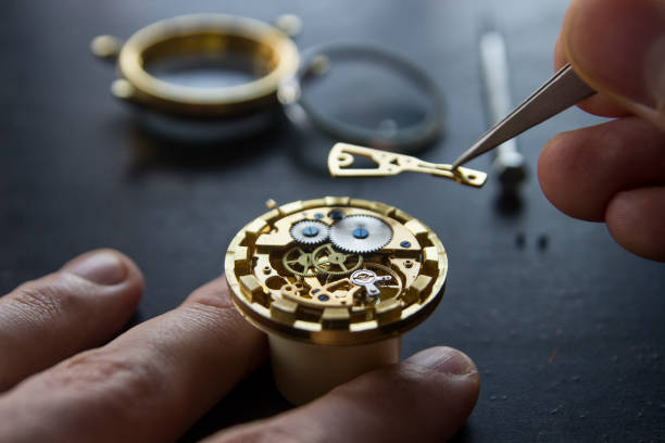 istock Process of installing a part on a mechanical watch, watch repair 913481824