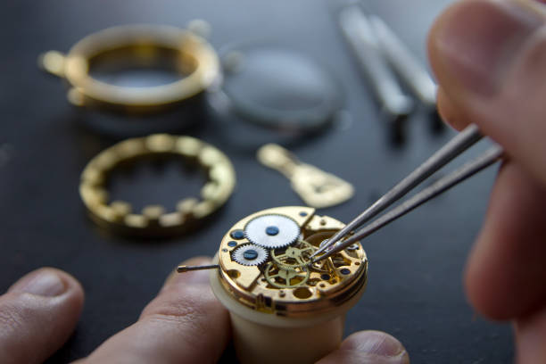 istock Watchmaker is repairing the mechanical watches in his workshop 913482014
