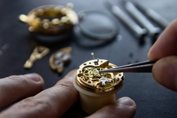 istock Process of installing a part on a mechanical watch, watch repair 913482492