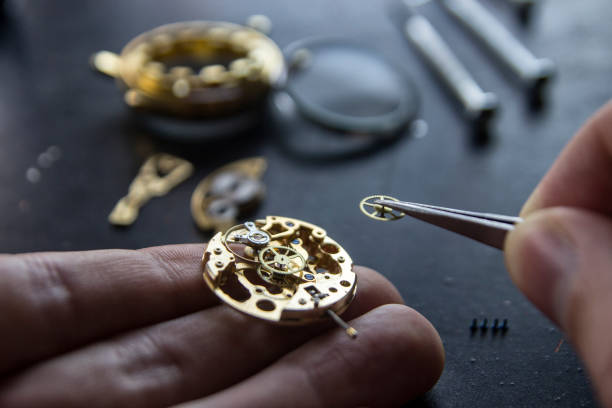 istock Process of installing a part on a mechanical watch, watch repair 913482636