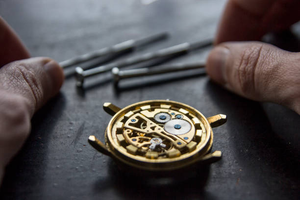 istock Watchmaker is repairing the mechanical watches in his workshop 913483066