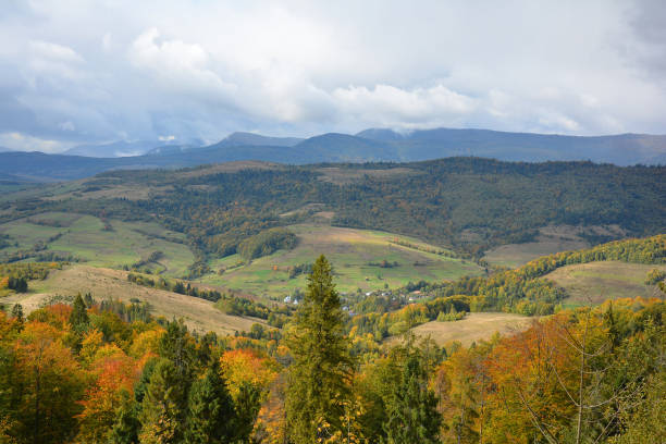istock View of mountains and valley from Veretskyi Pass in autumn day before rain. 913492388