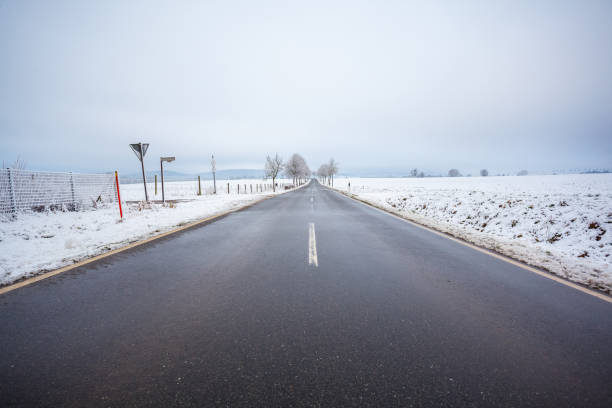istock winter landscape in germany, road, Gerrhausen, Goslar 913500264