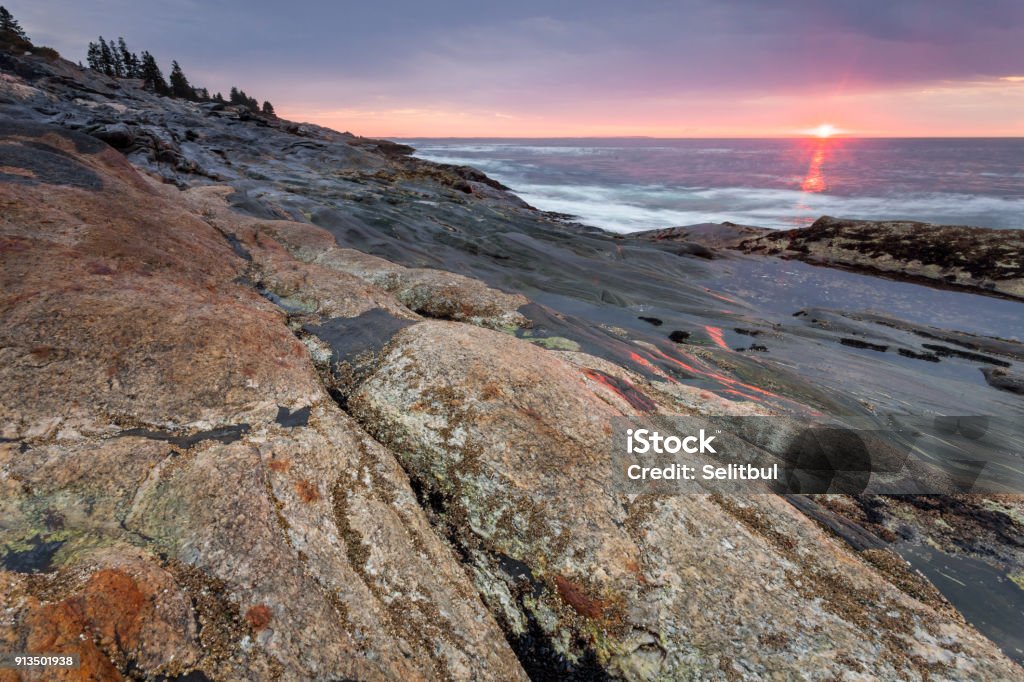 Sunrise in Maine, USA Sunrise at coastline near Pemaquid Point lighthouse, Maine, USA Coastline Stock Photo