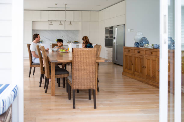 Family eating breakfast Family eating breakfast. Family eating together breakfast. brolga stock pictures, royalty-free photos & images