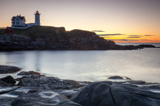 istock Nubble Lighthouse at sunrise, Maine, USA 913504328