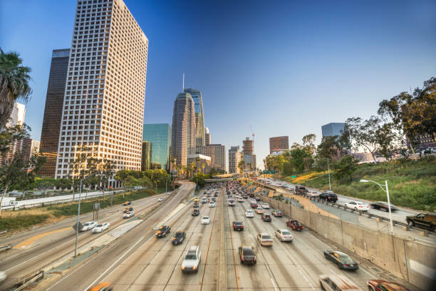 istock Los Angeles city skyline over the freeway traffic 913507358