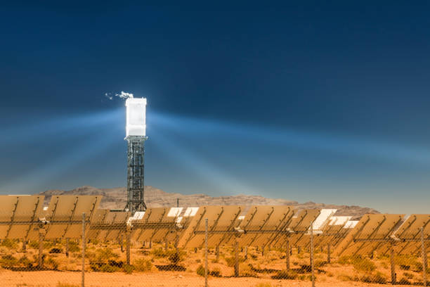 Sunlight is directed at a solar electric energy generating system thermal plant in the Mojave Desert